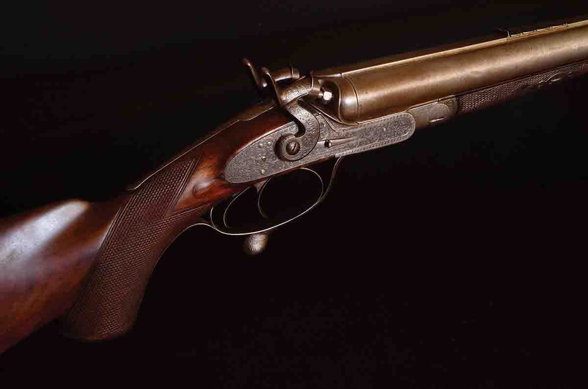 This combination gun (.577 Snider and 20-bore) bears the name of Joseph Braddell, a Belfast shooting-and-fishing shop. It probably originated in Birmingham in the mid-1870s and was finished by one of the Scottish gunmakers. The name of the engraver is lost to history, but his work speaks for itself.